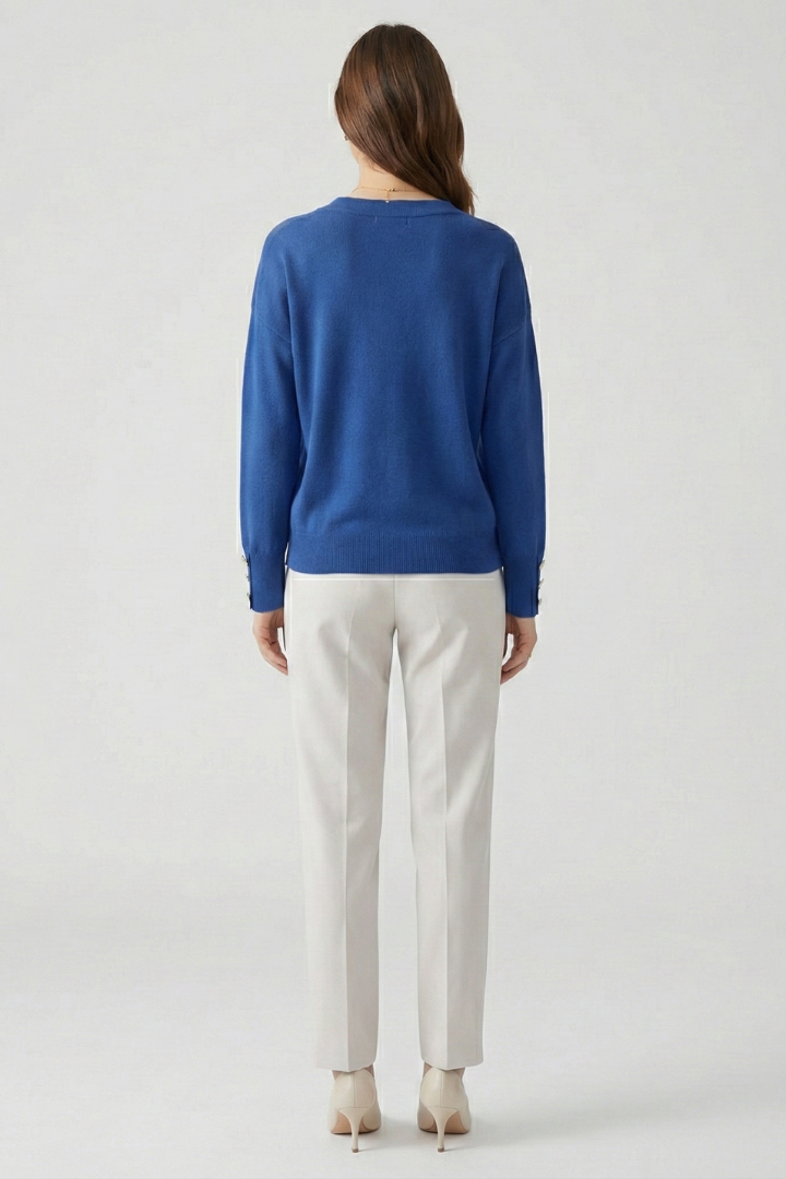 V-neck sweater with buttoned cuffs – styled view